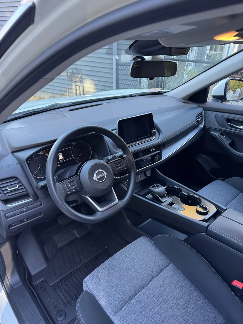 After: the Nissan cabin with clean mats, dash and seats